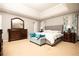 Main bedroom with king bed, sitting area, and ample closet space at 2513 Sonoma Vly, Villa Rica, GA 30180