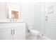 Contemporary bathroom with white herringbone tile shower and a white vanity at 550 Fisher Dr # 47, Alpharetta, GA 30009