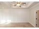 Bright bedroom with wood floors and wainscoting at 550 Fisher Dr # 47, Alpharetta, GA 30009