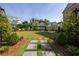 Spacious community park with a grassy lawn, stone pathway, and benches at 550 Fisher Dr # 47, Alpharetta, GA 30009