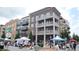 Vibrant street scene with shops, apartments and a farmers market at 550 Fisher Dr # 47, Alpharetta, GA 30009