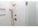 Shower with herringbone tile and rain shower head at 550 Fisher Dr # 47, Alpharetta, GA 30009