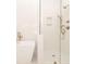 Walk-in shower with herringbone tile and glass door at 550 Fisher Dr # 47, Alpharetta, GA 30009