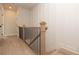 Elegant staircase with black metal balusters at 550 Fisher Dr # 47, Alpharetta, GA 30009
