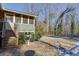 Screened porch, wooden stairs, and fenced backyard at 2500 Cottonwood Dr, Marietta, GA 30066