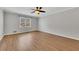 Bright bedroom with hardwood floors and a large window at 2500 Cottonwood Dr, Marietta, GA 30066