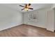 Bedroom with hardwood floors, ceiling fan, and window at 2500 Cottonwood Dr, Marietta, GA 30066