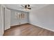 Bedroom with hardwood floors, ceiling fan and window at 2500 Cottonwood Dr, Marietta, GA 30066