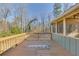 Wooden deck overlooking a wooded backyard at 2500 Cottonwood Dr, Marietta, GA 30066