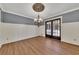 Spacious dining room with hardwood floors and french doors at 2500 Cottonwood Dr, Marietta, GA 30066