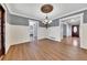 Bright dining room with hardwood floors and access to other rooms at 2500 Cottonwood Dr, Marietta, GA 30066