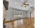 Open living room with hardwood floors and ceiling fans at 2500 Cottonwood Dr, Marietta, GA 30066