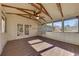 Screened porch with wood-look flooring and French doors at 2500 Cottonwood Dr, Marietta, GA 30066