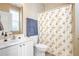 Clean bathroom with shower/tub combo and white vanity at 340 Glens Way, Woodstock, GA 30188