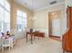 Bright dining room features a chandelier and hardwood floors at 340 Glens Way, Woodstock, GA 30188