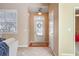 Bright and airy entryway with neutral walls and hardwood flooring at 340 Glens Way, Woodstock, GA 30188