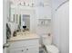 Clean bathroom with a vanity and shower/tub combo at 631 Granville Ct, Atlanta, GA 30328