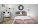 Bright bedroom with plush bedding and mirrored dresser at 631 Granville Ct, Atlanta, GA 30328