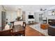 Open dining area with dark wood table and view of living room at 631 Granville Ct, Atlanta, GA 30328