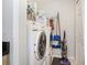 Convenient laundry room with washer, dryer, and storage at 631 Granville Ct, Atlanta, GA 30328