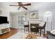 Living room features hardwood floors, fireplace and access to a patio at 631 Granville Ct, Atlanta, GA 30328