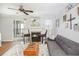 Cozy living room featuring a fireplace, hardwood floors and comfy seating at 631 Granville Ct, Atlanta, GA 30328