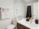 Clean and modern bathroom with a large mirror at 6900 Roswell Rd, Atlanta, GA 30328