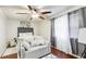 Spacious bedroom with hardwood floors and ceiling fan at 6900 Roswell Rd, Atlanta, GA 30328