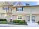 Attractive exterior of townhome with landscaping at 6900 Roswell Rd, Atlanta, GA 30328