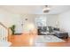 Bright living room with hardwood floors and sectional sofa at 6900 Roswell Rd, Atlanta, GA 30328