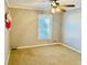 Bedroom featuring a ceiling fan, natural lighting, and neutral wall color at 850 Airline Rd, Mcdonough, GA 30252