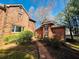 Brick exterior of the home and a connecting brick walkway and entrance give classic charm at 850 Airline Rd, Mcdonough, GA 30252