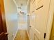 Hallway entrance leading to a bedroom featuring neutral wall color and beige carpet at 850 Airline Rd, Mcdonough, GA 30252