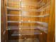 Walk-in pantry featuring wood paneling and ample wire shelving at 850 Airline Rd, Mcdonough, GA 30252