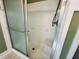 White tiled stand up shower with glass door at 850 Airline Rd, Mcdonough, GA 30252