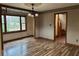 Dining room with hardwood floors and stained glass window at 850 Airline Rd, Mcdonough, GA 30252