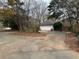 Long driveway leading to a detached garage at 850 Airline Rd. Rd, Mcdonough, GA 30252