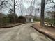 Driveway to detached garage with wooden borders at 850 Airline Rd. Rd, Mcdonough, GA 30252