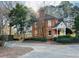 Brick home with large deck and mature trees at 850 Airline Rd, Mcdonough, GA 30252