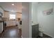 Small modern bathroom with gray vanity and granite countertop at 12558 Lakeside Pkwy, Fayetteville, GA 30215