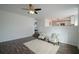 Living room with hardwood floors and ceiling fan at 12558 Lakeside Pkwy, Fayetteville, GA 30215