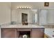 Bathroom with double vanity and granite countertops at 180 Paces Lakes Pointe St, Dallas, GA 30157