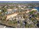 Aerial view showcasing the community's golf course and lake at 2585 Club Springs Dr, Roswell, GA 30076