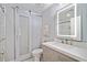 Updated bathroom features a modern vanity, glass shower, and stylish barn door at 2585 Club Springs Drive, Roswell, GA 30076