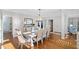 Elegant dining room with hardwood floors and a large table at 2585 Club Springs Drive, Roswell, GA 30076