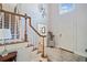 Two-story foyer with staircase and hardwood floors at 2585 Club Springs Drive, Roswell, GA 30076