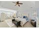 Large main bedroom with tray ceiling, sitting area and ample natural light at 2585 Club Springs Drive, Roswell, GA 30076