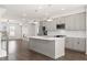 Modern kitchen featuring gray cabinets, quartz countertops, and an island at 3808 Thatcher Sw Dr, Marietta, GA 30008