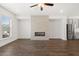 Living room featuring hardwood floors and a contemporary fireplace at 3808 Thatcher Sw Dr, Marietta, GA 30008