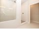 Bathroom with white herringbone tile shower and glass enclosure at 550 Fisher Dr # 46, Alpharetta, GA 30009